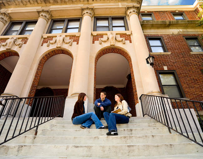 college campus - students sitting on steps