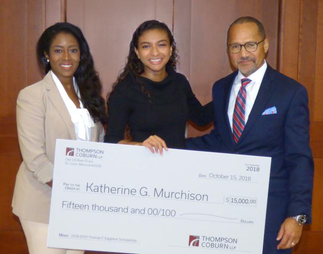 Felicia Williams and Booker Shaw presenting the Eagleton Scholarship to Katherine Murchison