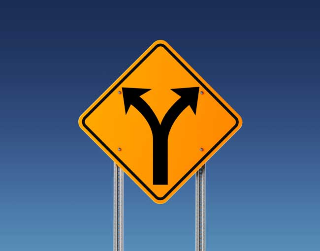 Road sign forking in two directions