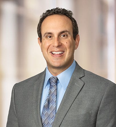 Media item displaying Justin M. Newman